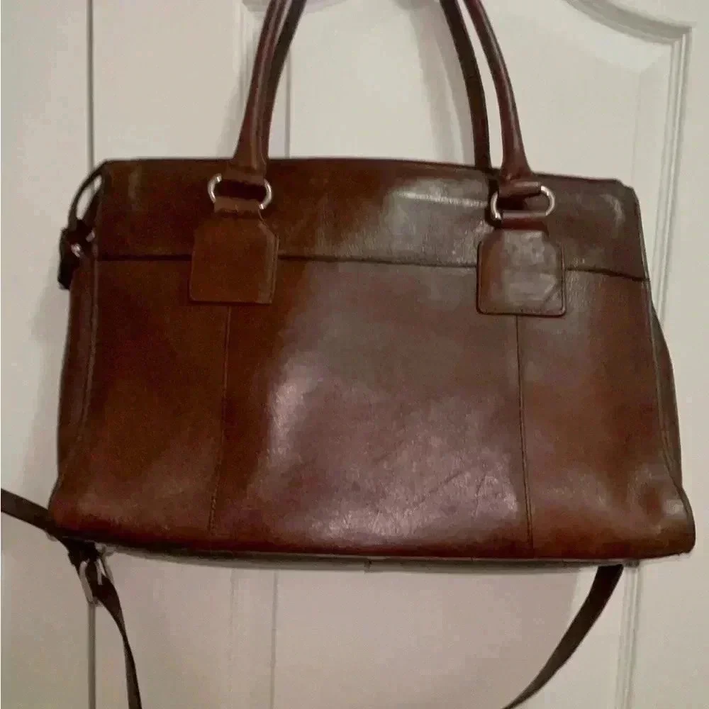 Wilson leather original back, rown color great conditions with adjstbel strap